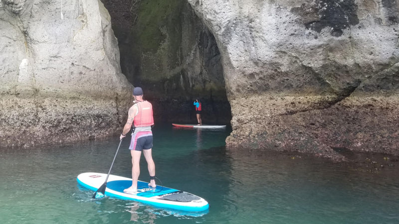 Join Coromandel Paddle Boarding for a fun scenic SUP tour, following the calm coastal waters to Lonely Bay.